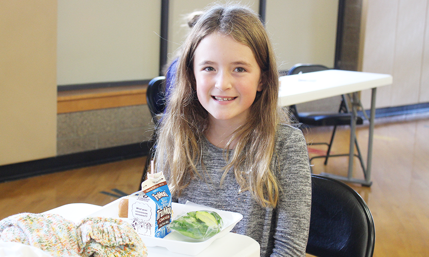 Student with school lunch