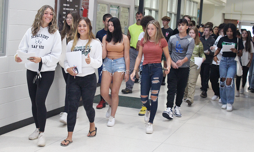 Students lead tour through hallway