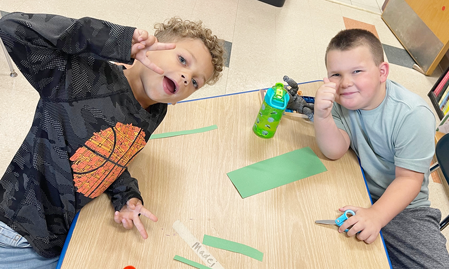 Students work on paper chain