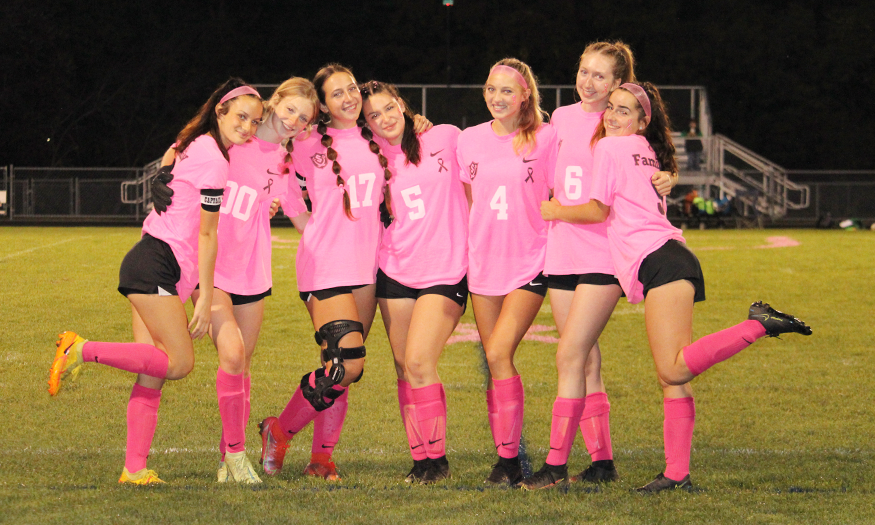 Girls soccer players pose for group photo