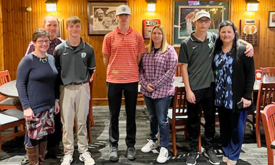Students golfers with families