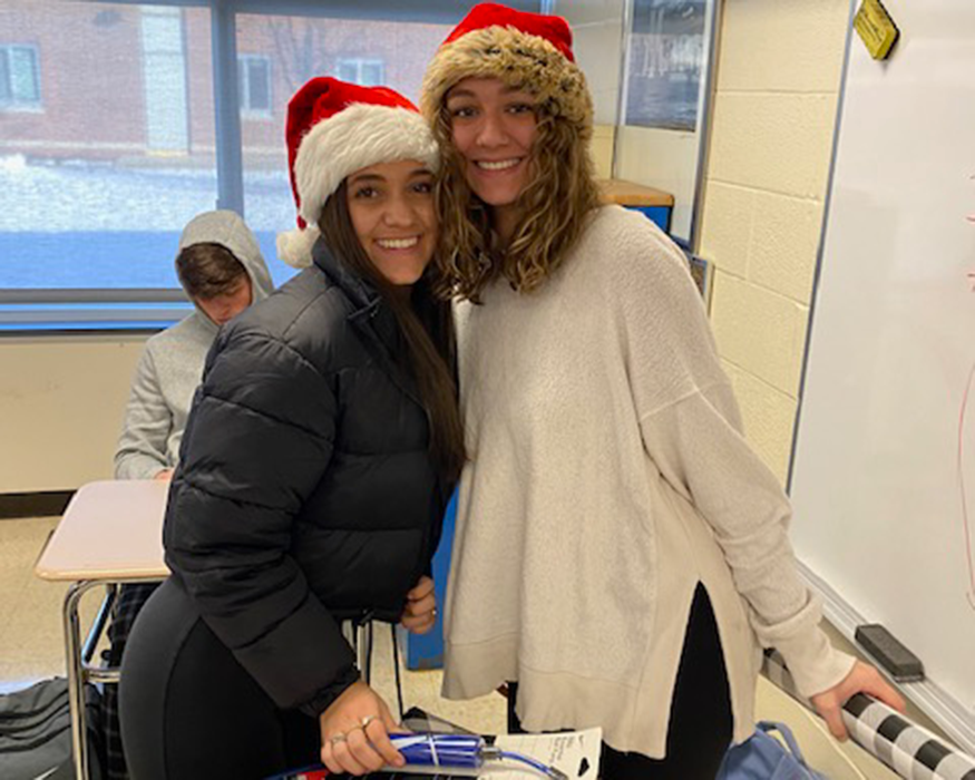 Students wrap presents in classroom