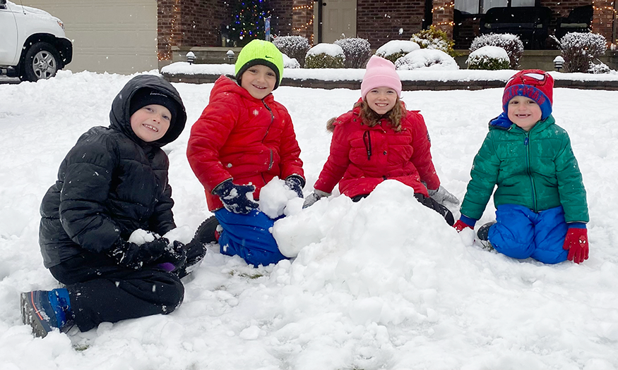 Students play in snow