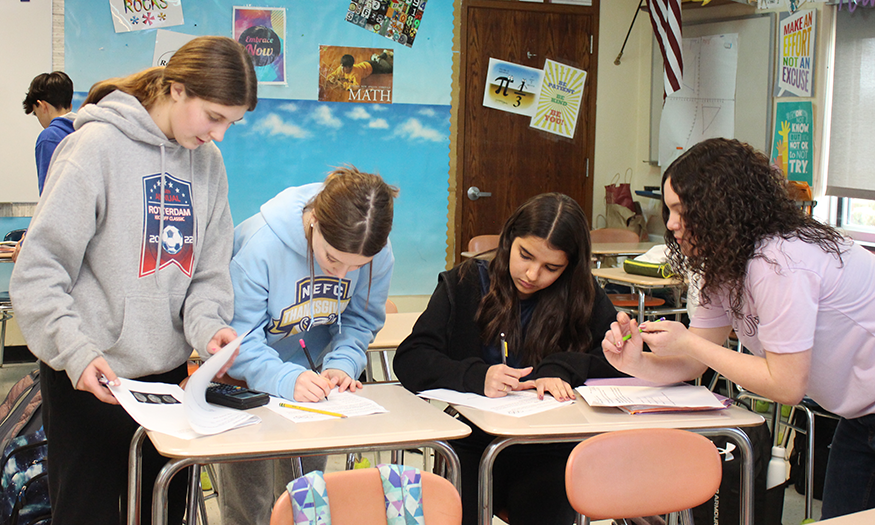 Students take notes in class