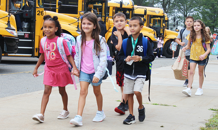 Students walk into school on first day