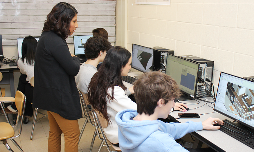 Architectural Designer works with students