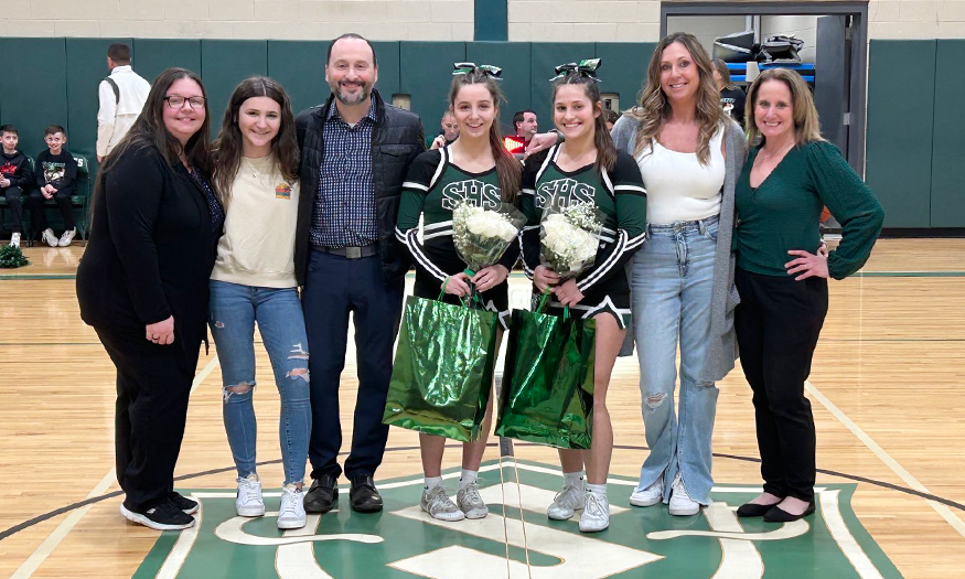 Group photo of seniors with family