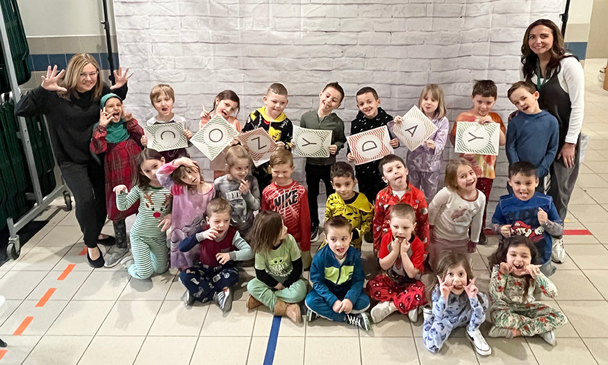 Students pose for photo on Cozy Day