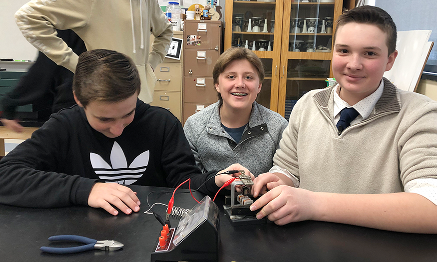 Students work on wind turbine