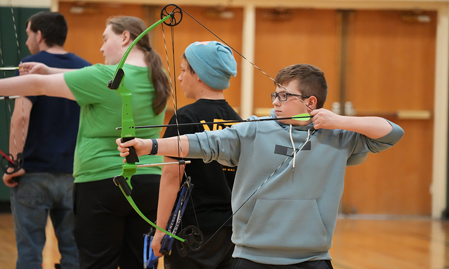 Students with archery bows