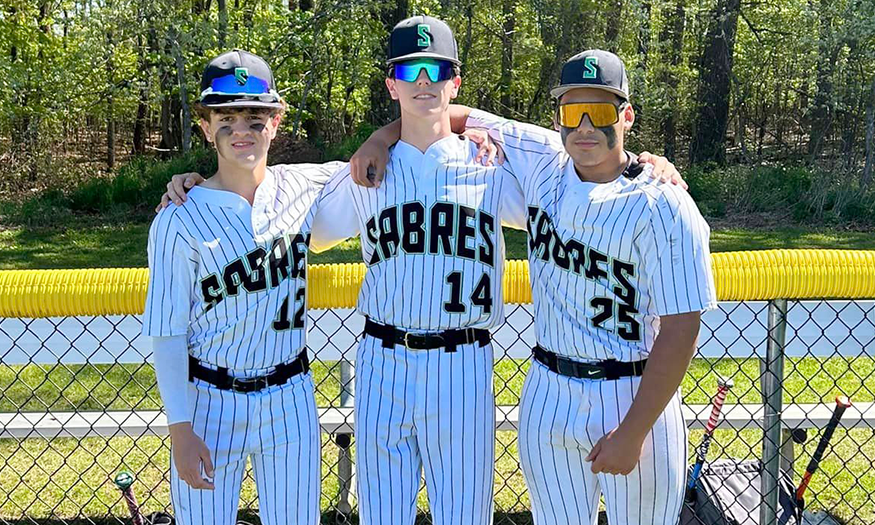 Group photo of three baseball players