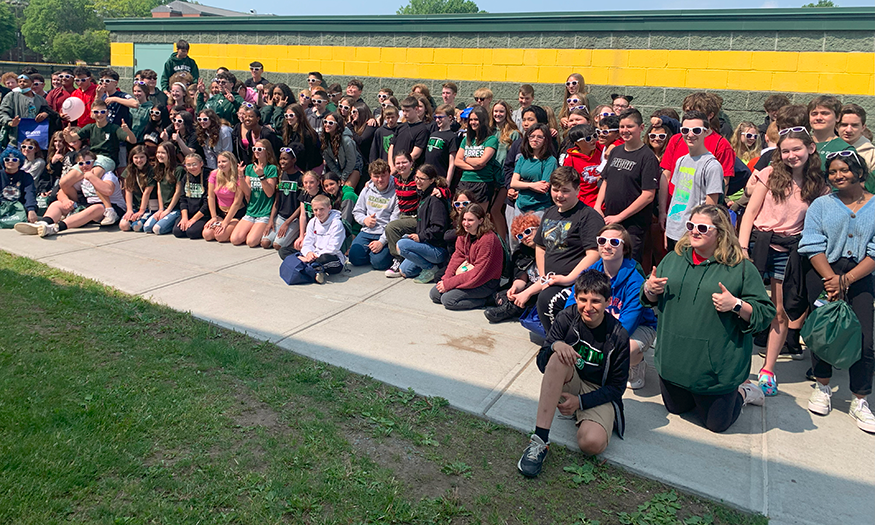 Students gather outside for group photo