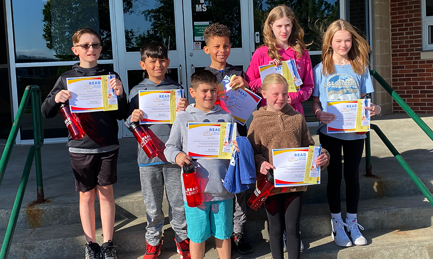 Group photo of students holding certificates