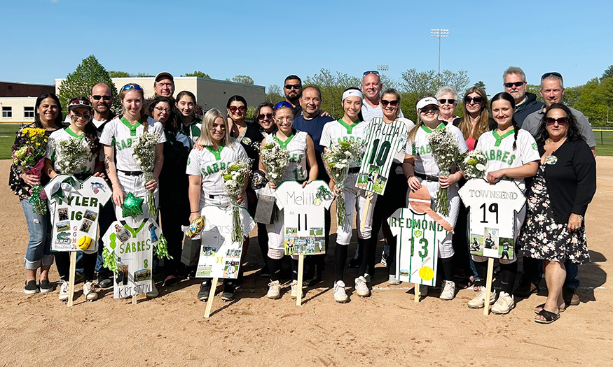 Group photo of softball seniors and families