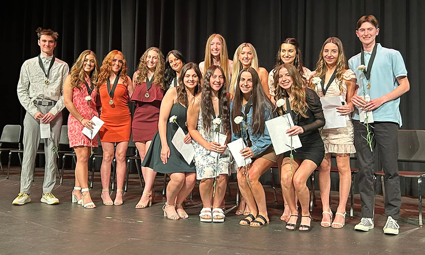 Group photo of students on stage