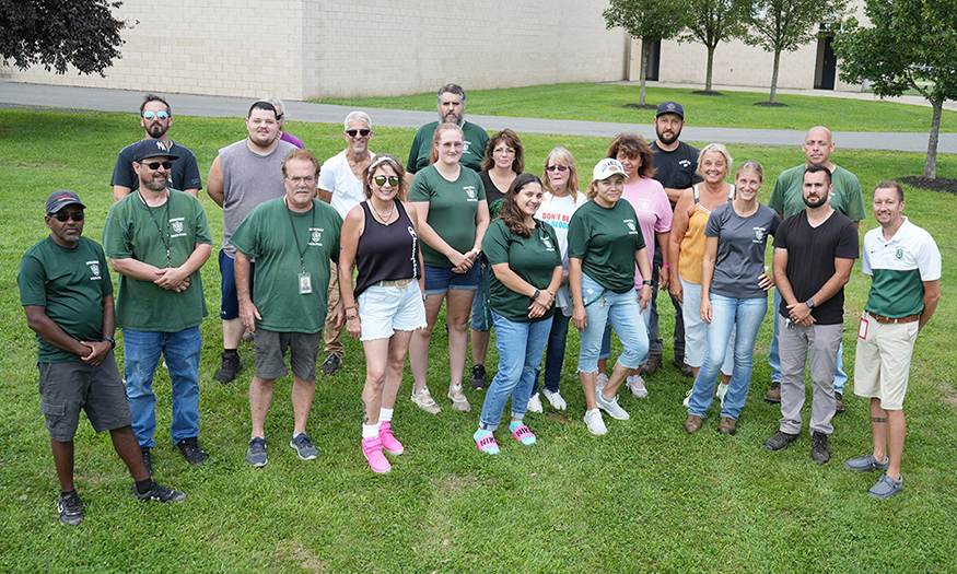 Facilities staff poses for group photo