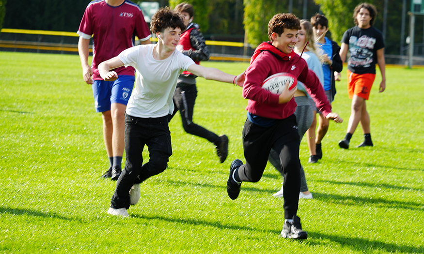 Students play rugby