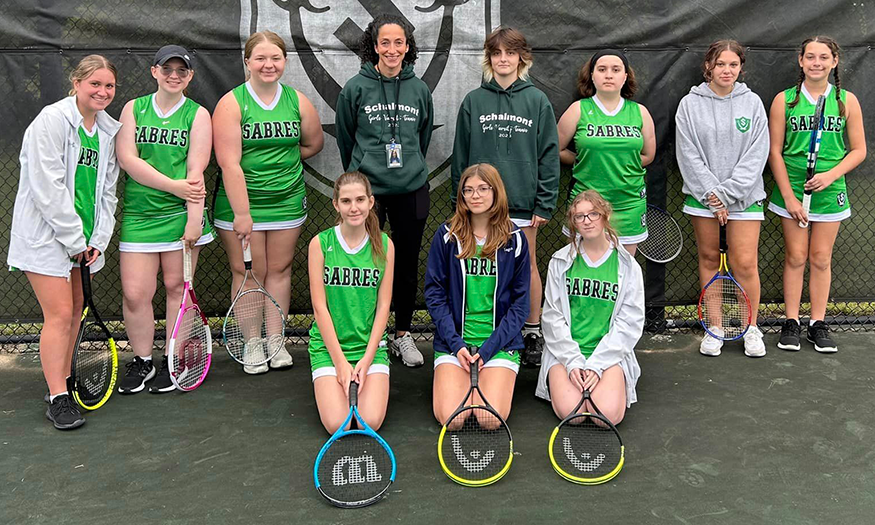 Girls tennis team poses for group photo