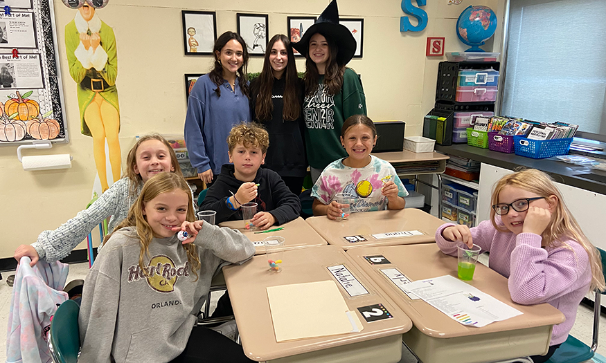 Students enjoy Halloween fun in class