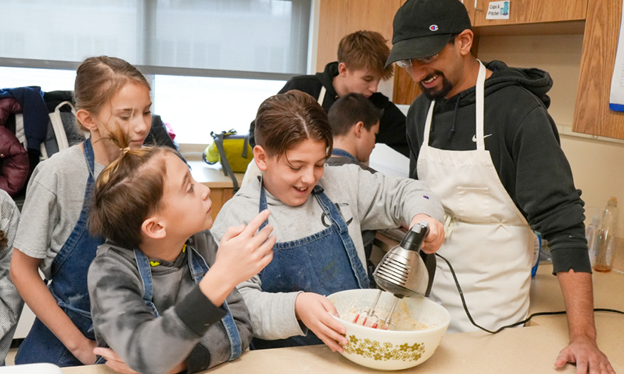 Students make cookies together