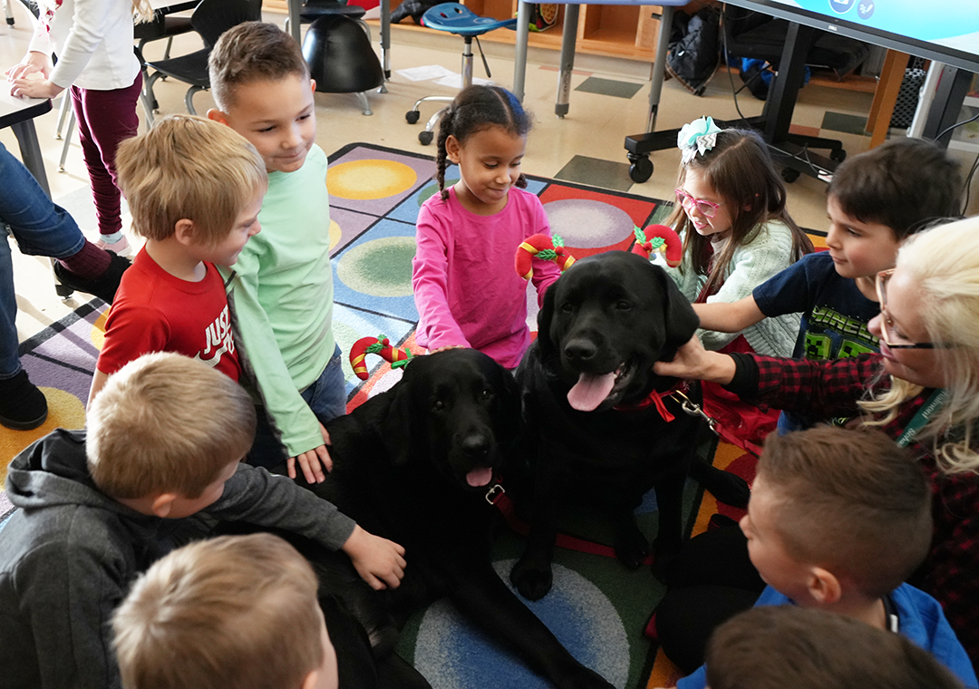 Therapy dog with students