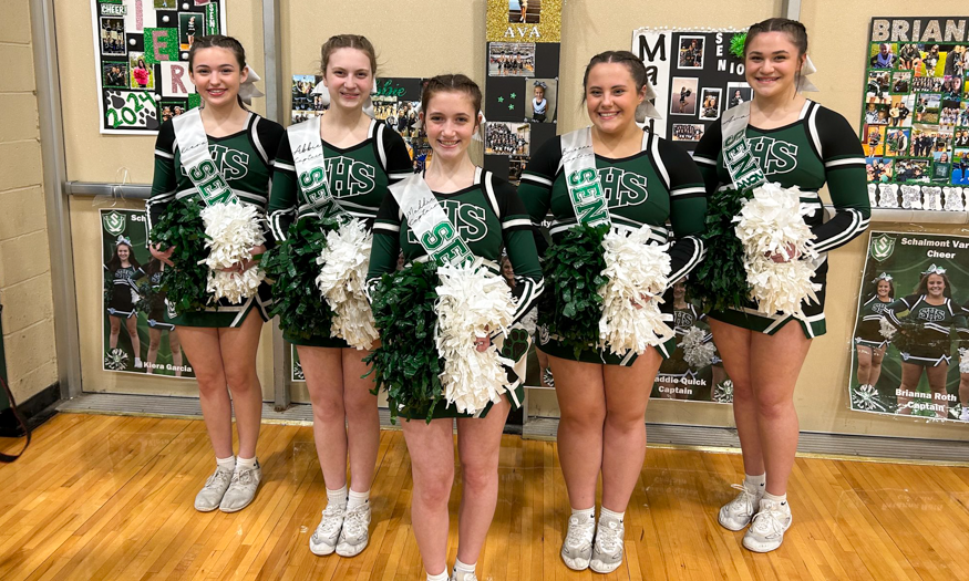 Senior cheerleaders pose for photo