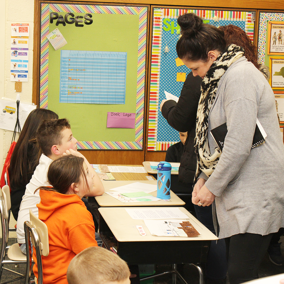 Assistant Principal listens to student