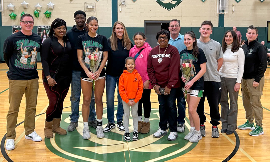 Group photo of families in gym