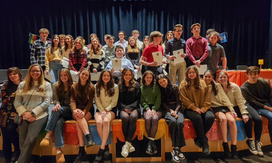 Group photo of students on stage