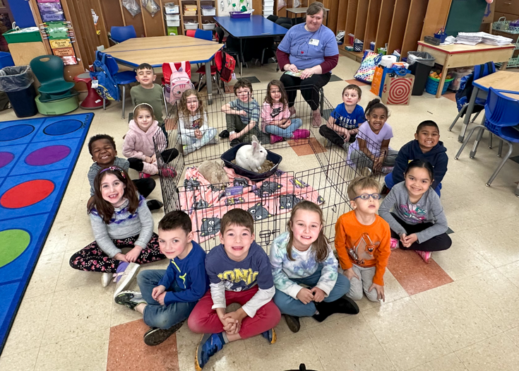 Students with bunnies in class