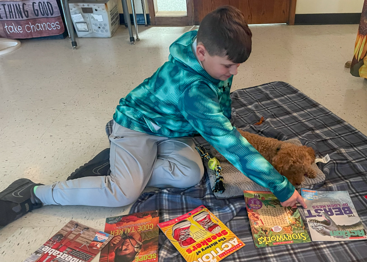 Student with therapy dog