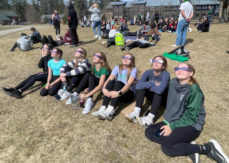 Students watch solar eclipse