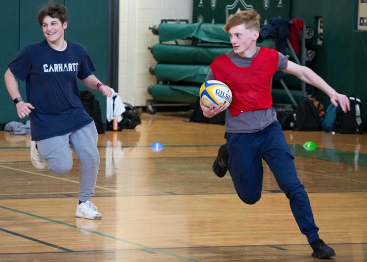 Students play rugby