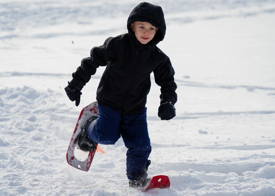 Student snowshoes