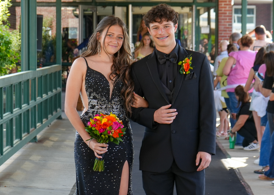 Students pose for a photo before prom