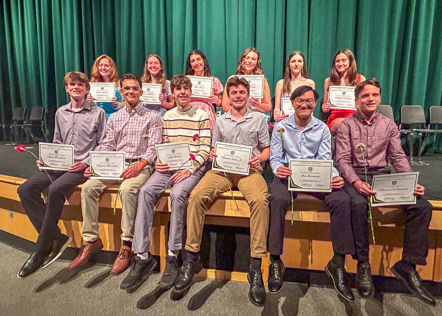 Group photo of students on stage