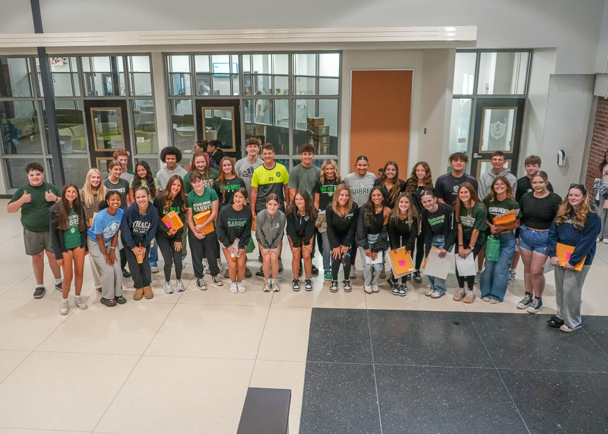 Group of students pose for photo