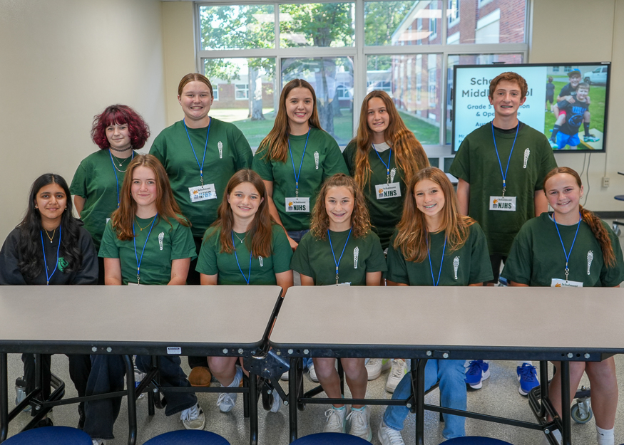 Group of students pose for photo
