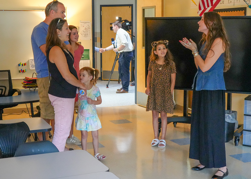 Teacher talks with family