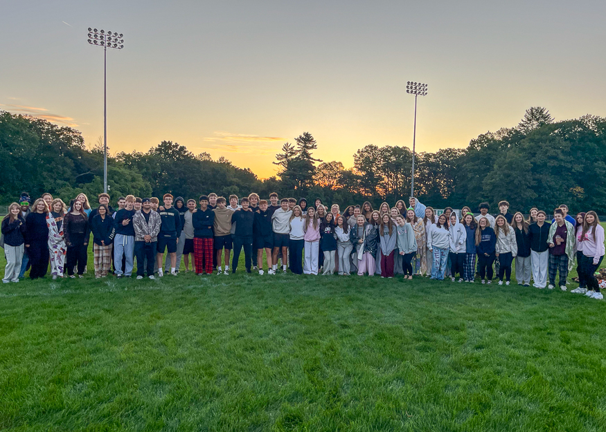 Group photo of students at sunrise