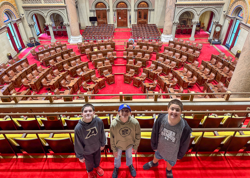 Students pose for photo in Capitol