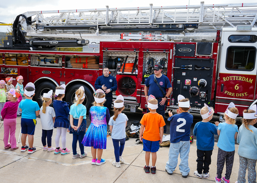 Students with firefighters