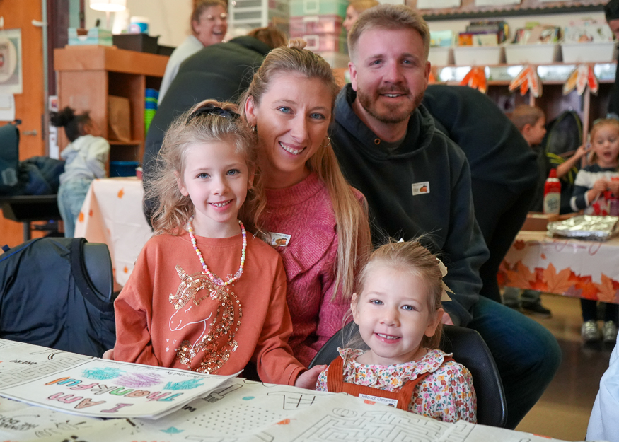Family poses for photo