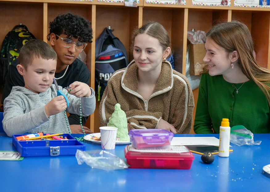Students work together on craft