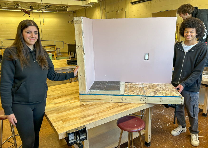 Students show off home repair project