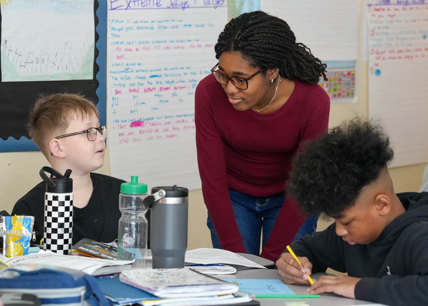 Students listens to other student