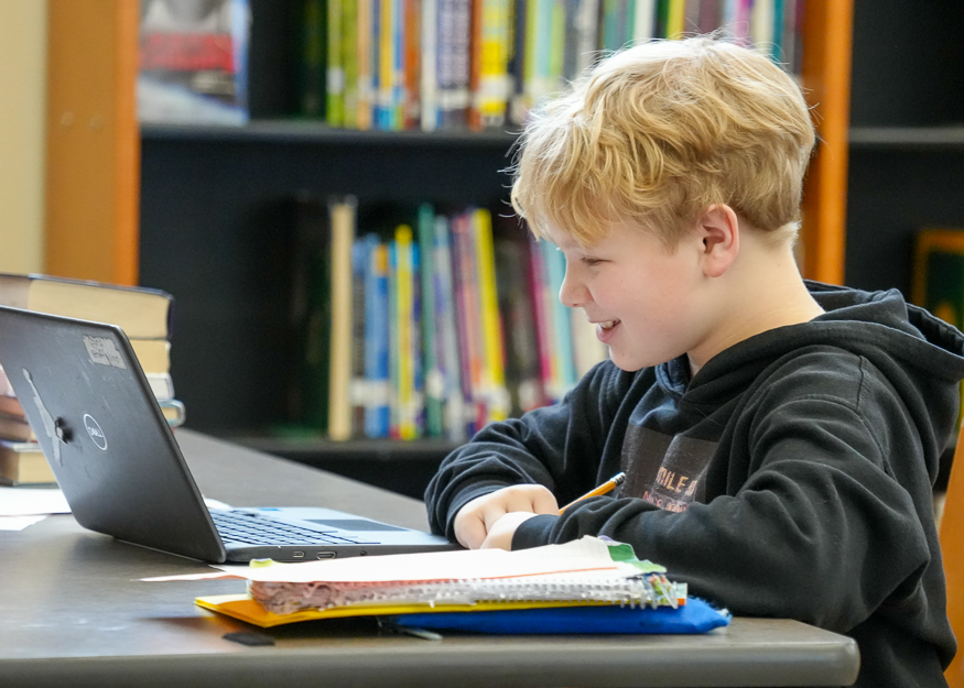 Student works on Chromebook