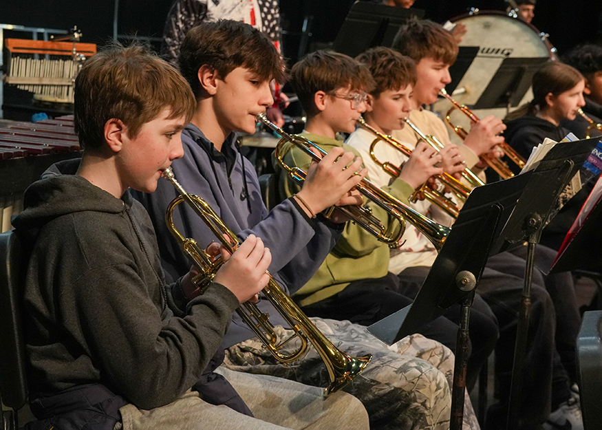 Students rehearse instruments