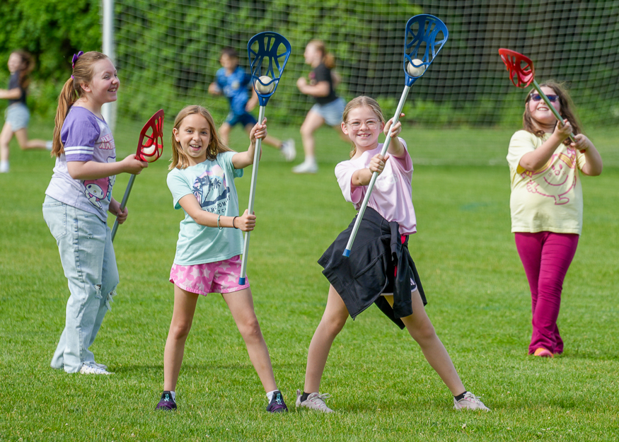 Students pose for photo in PE class
