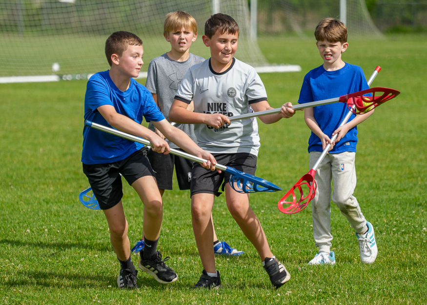 Students play lacrosse